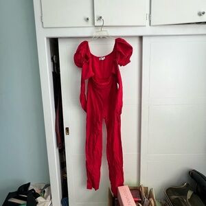 Red jumpsuit with tie in front